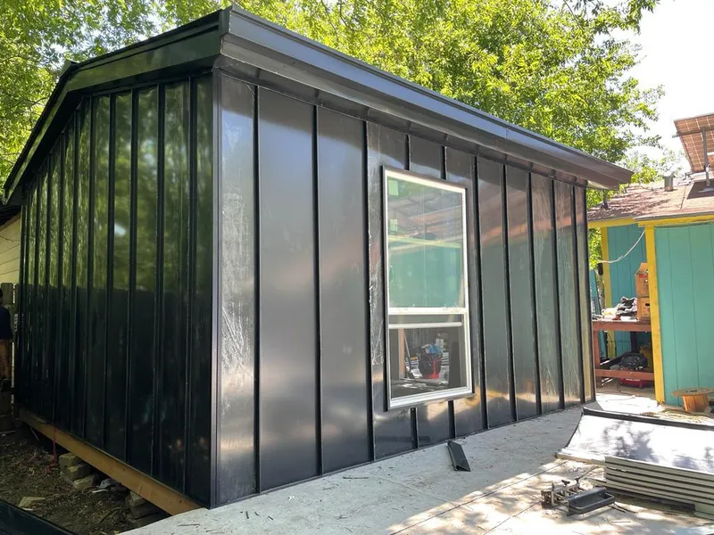 Black standing seam metal wall panels for Metal Roof Installation in Bogota