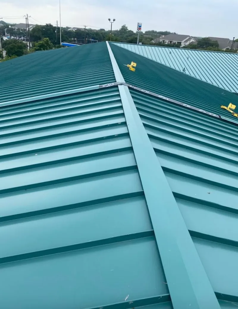 Green commercial metal roof ridge and valley for Metal Roof Repair in Bogota